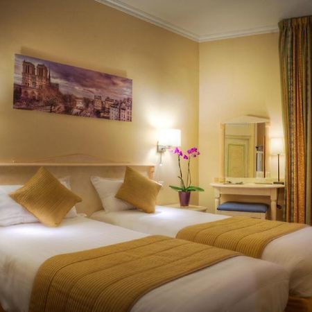 Hotel Louvre Sainte Anne Paris Quarto foto