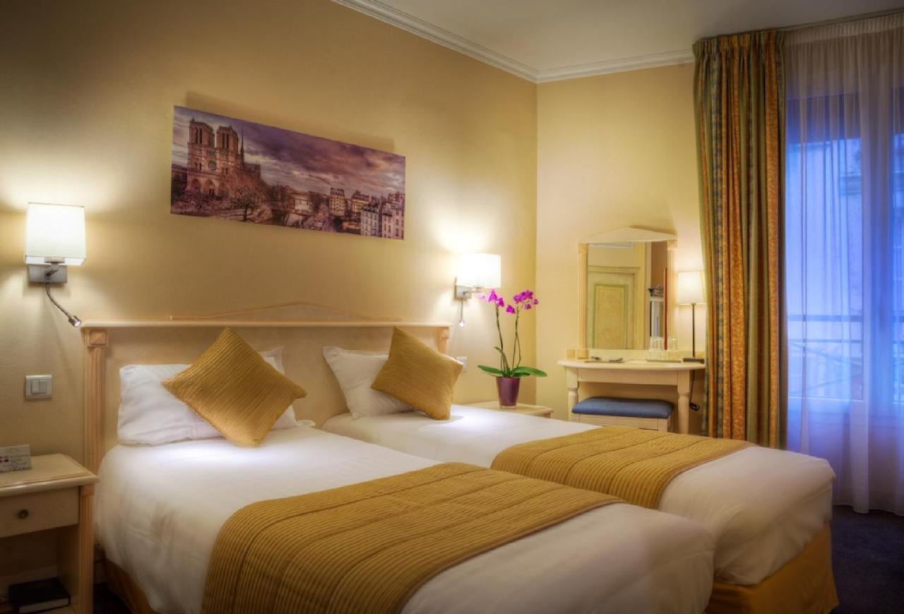 Hotel Louvre Sainte Anne Paris Quarto foto